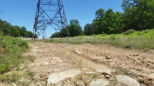 Hardscrabble dirt and power line