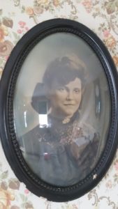 old-timey portrait photo of young woman