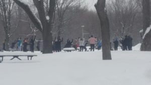 outdoor yoga class in the snow