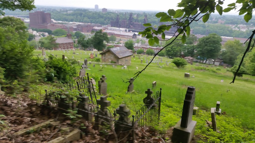 old cemetery with city in background